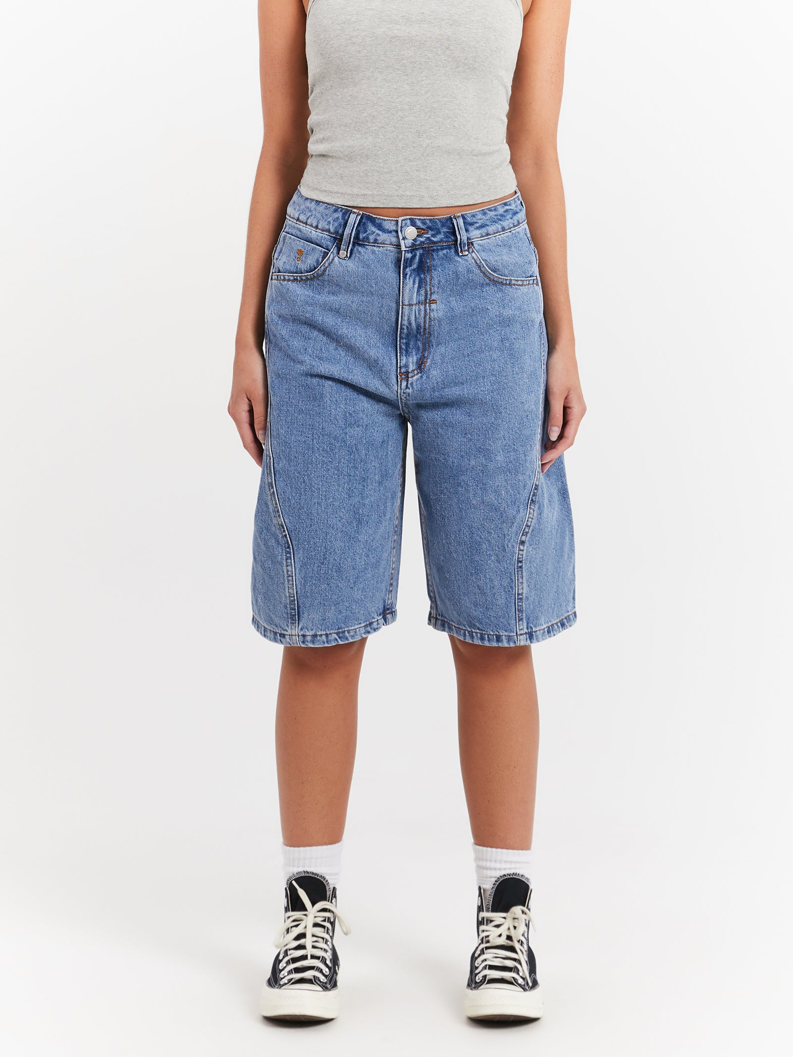 Ronnie Pieced Denim Shorts in Rinsed Blue