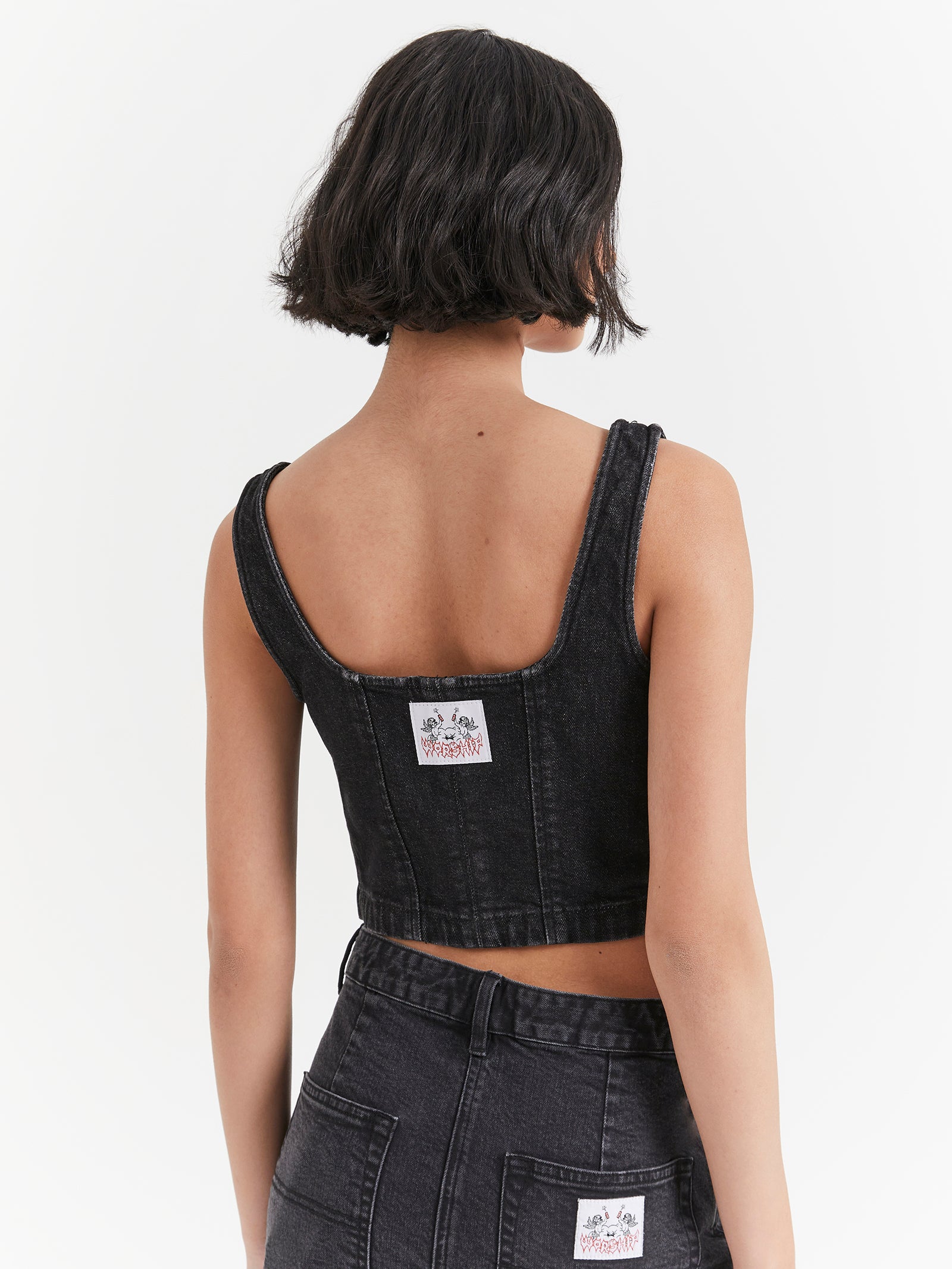 Mysteries Denim Corset Top in Used Black