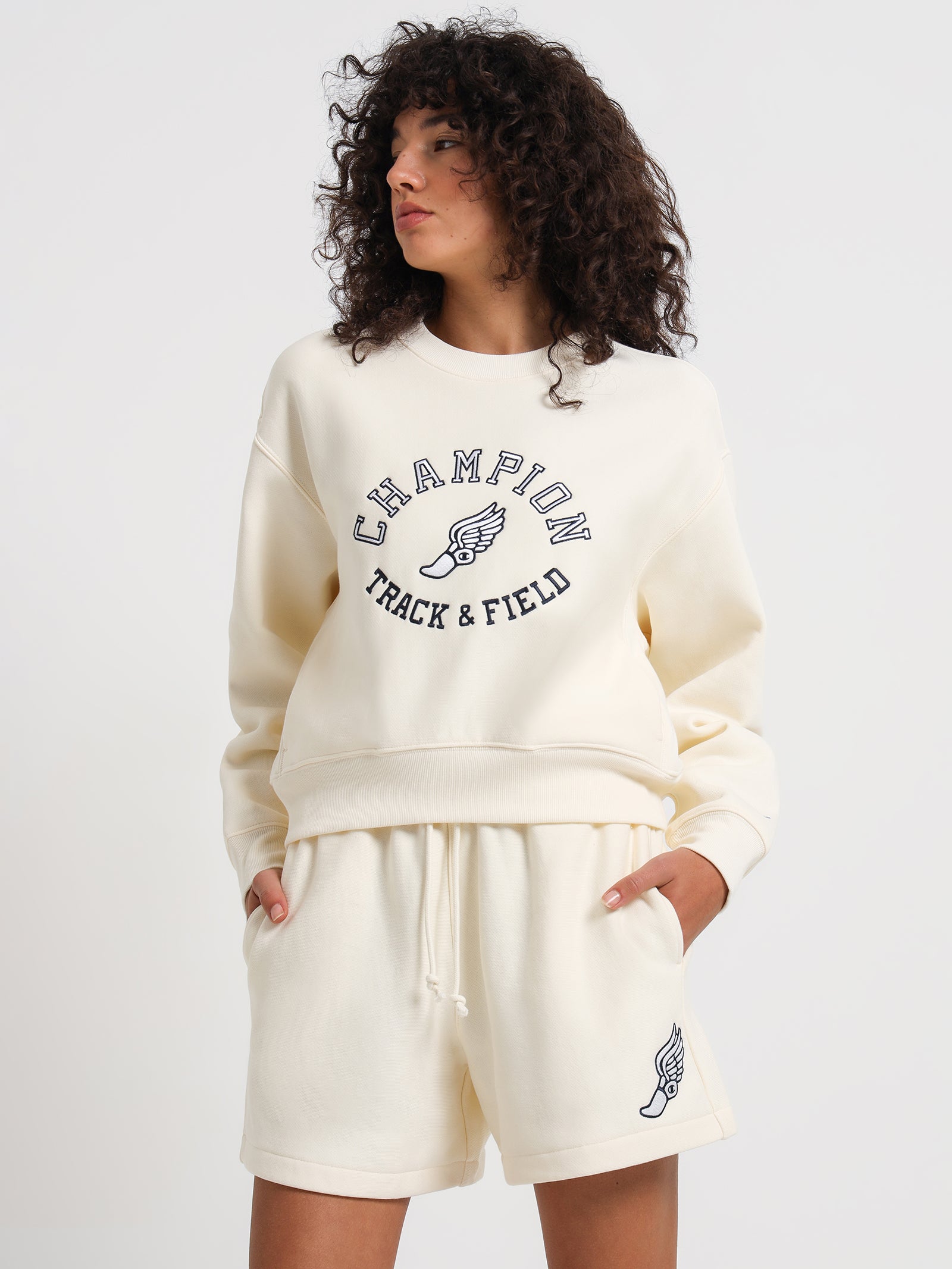 Reverse Weave Collegiate Track & Field Crew Sweater in Chalk White