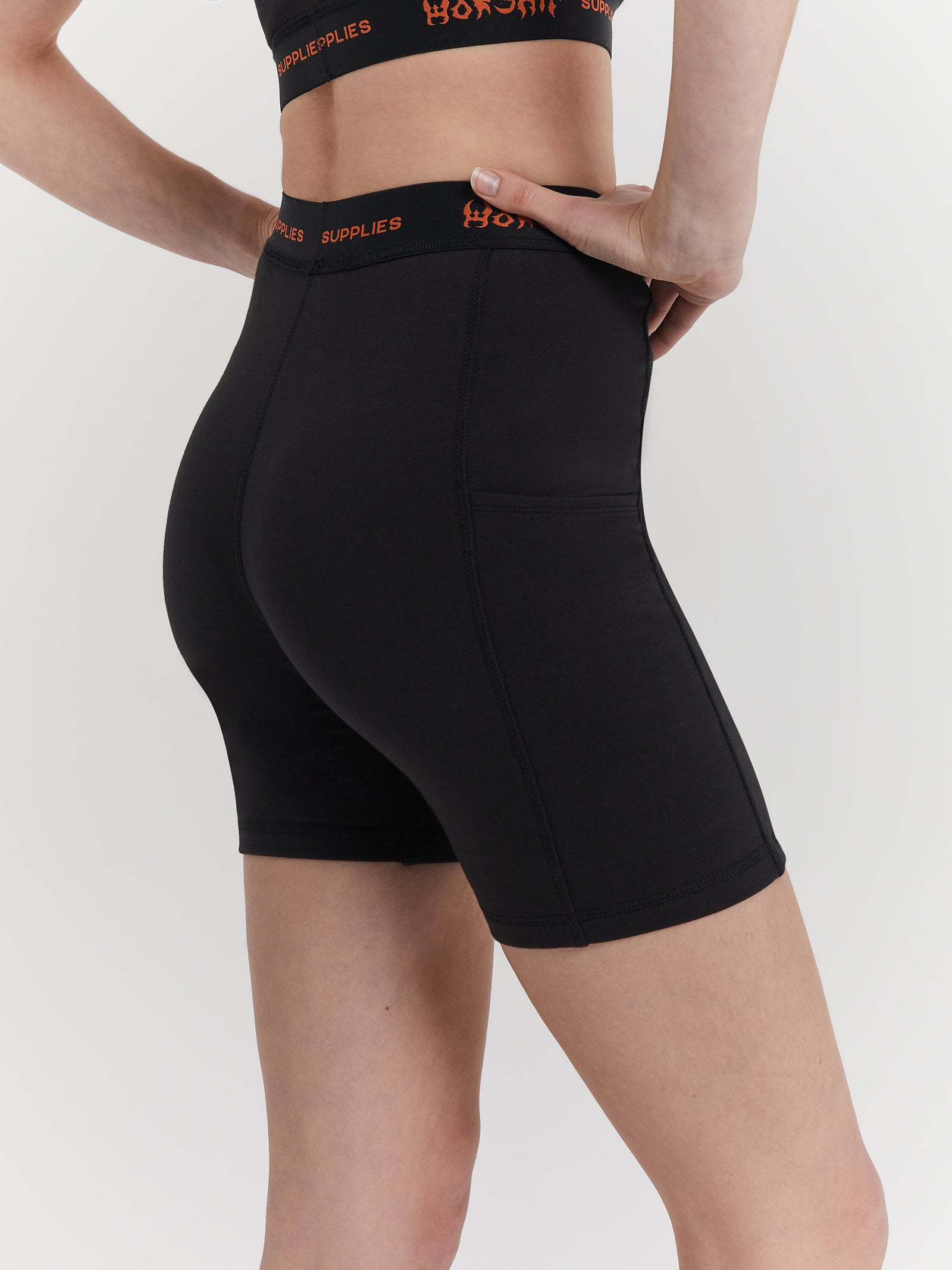 Worship Rapid Bike Shorts in Black & Orange