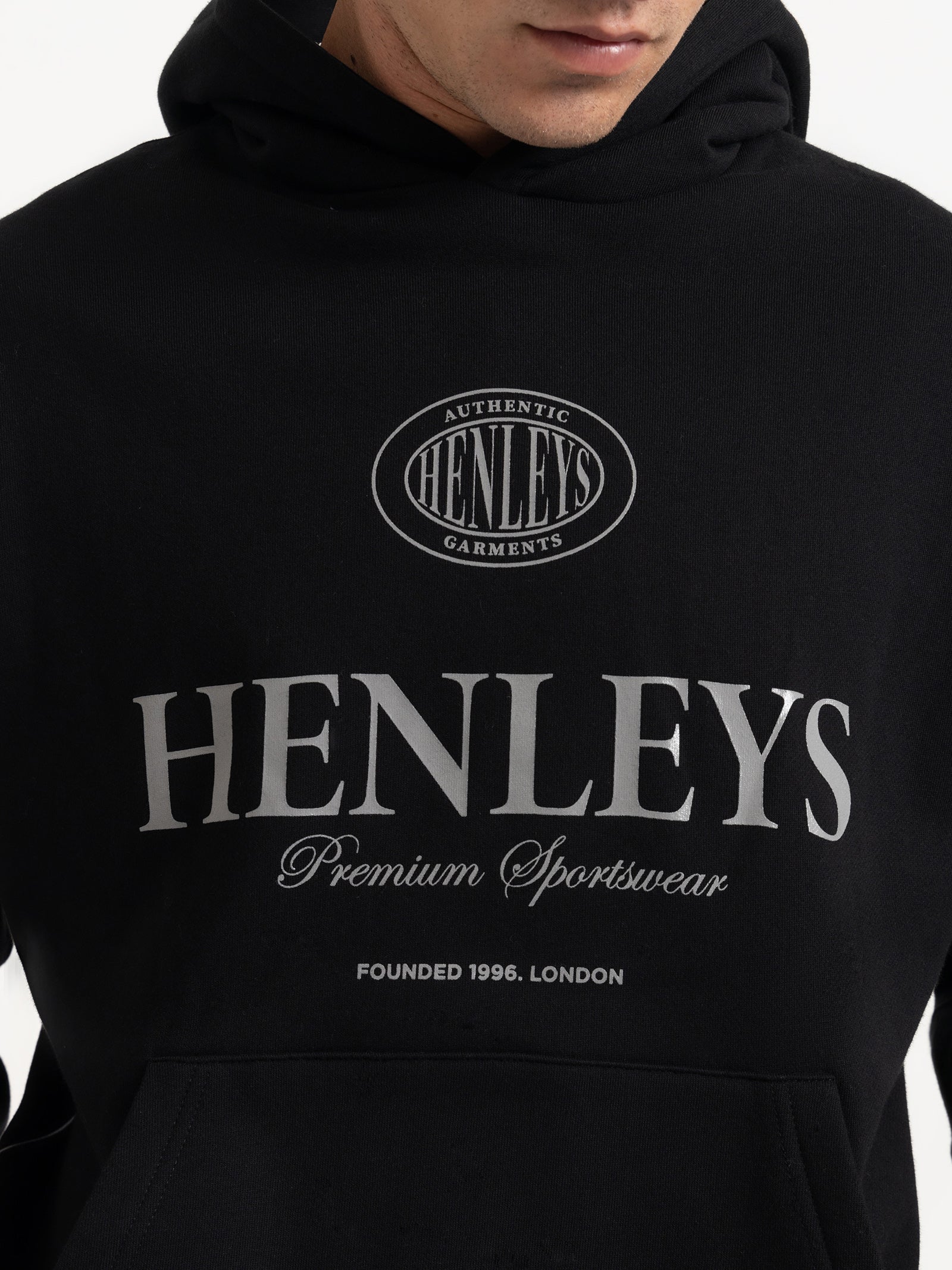 Varsity Reflect Hooded Sweater in Black