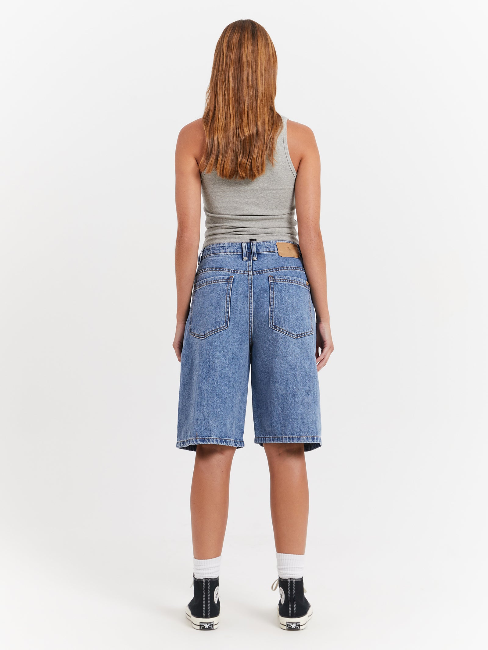 Ronnie Pieced Denim Shorts in Rinsed Blue