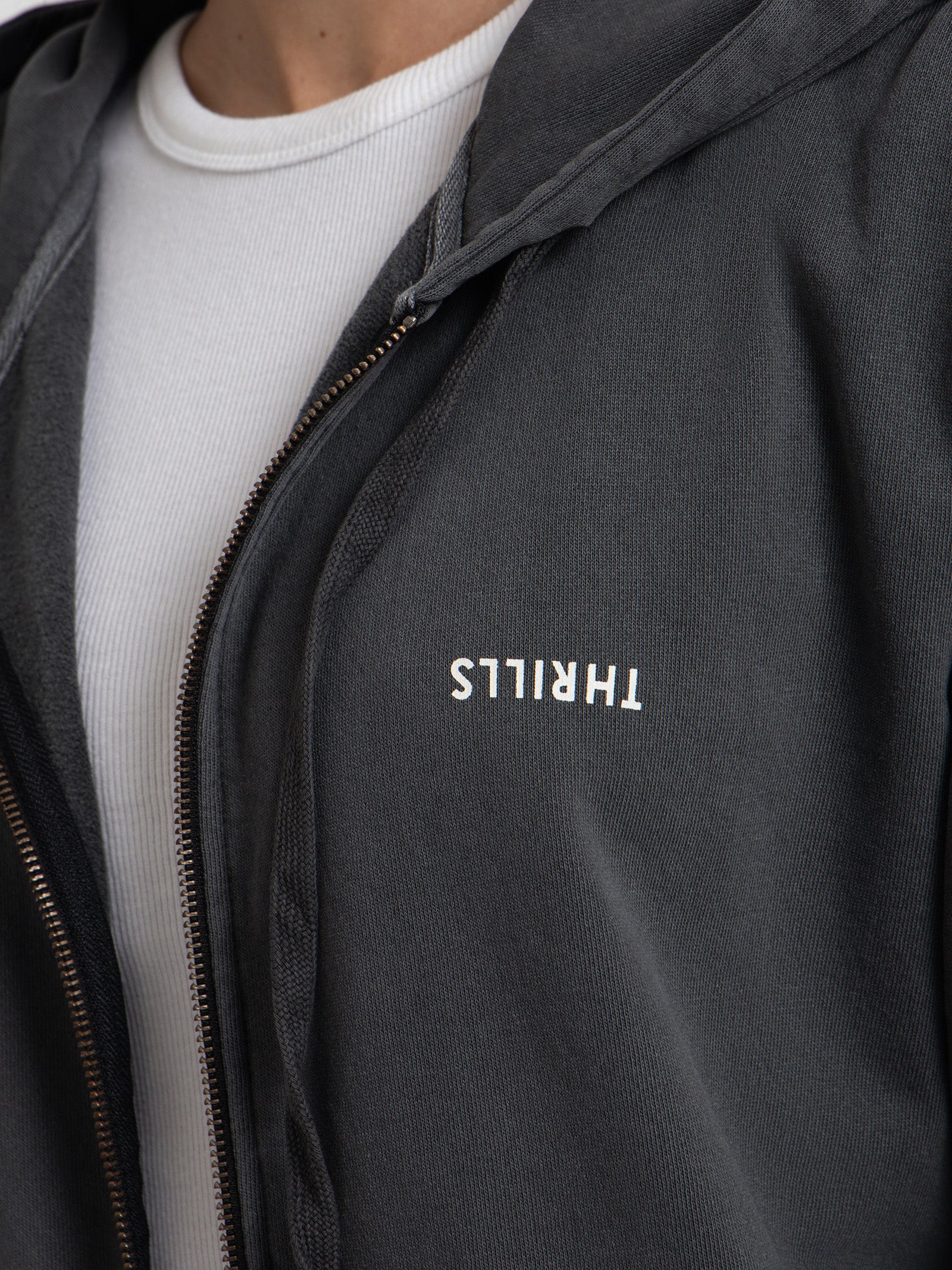 Minimal Thrills Zip Up Hood in Merch Black