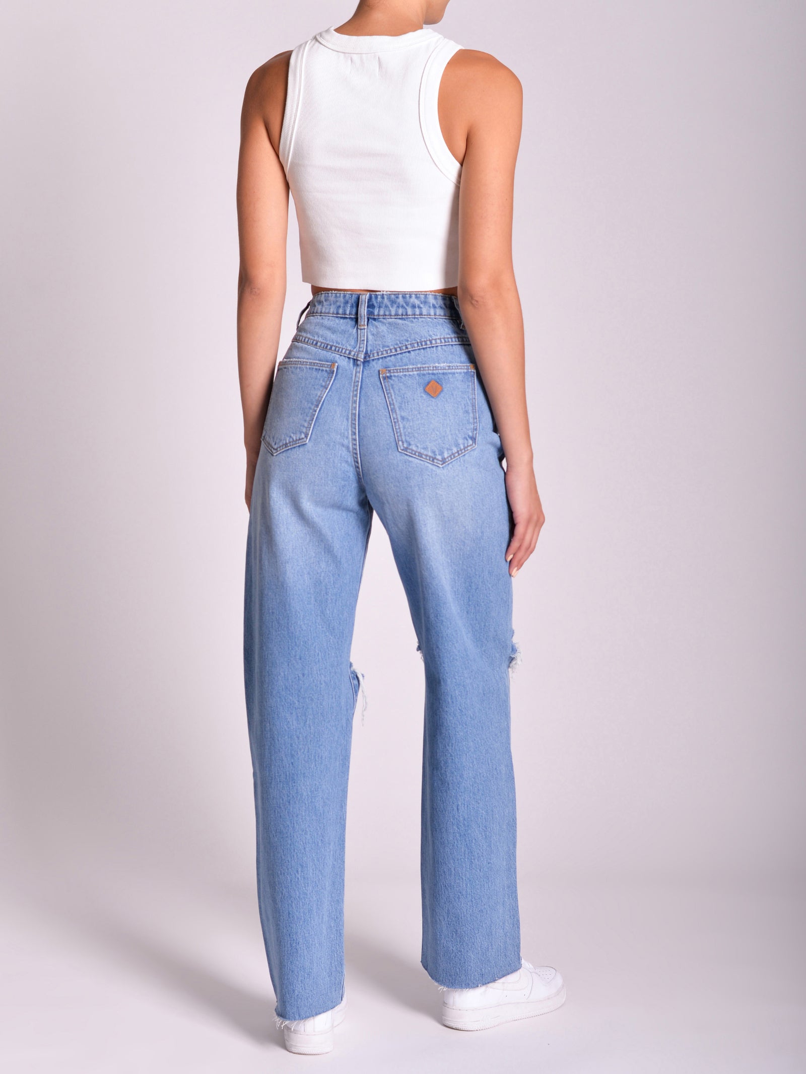 Carrie Britt Rip Recycled Jeans in Mid Vintage Blue