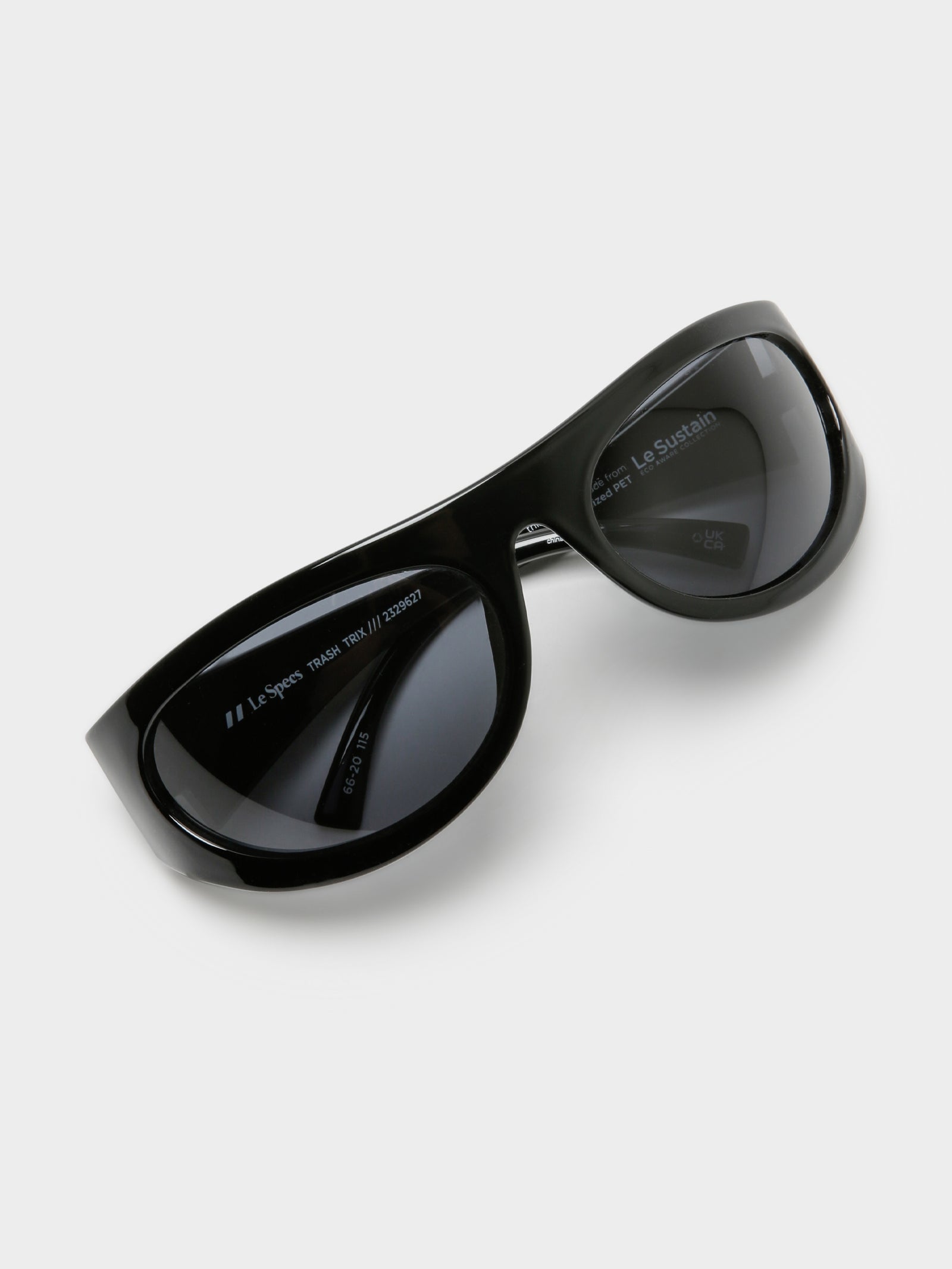 Trash Trix Sunglasses in Black Smoke