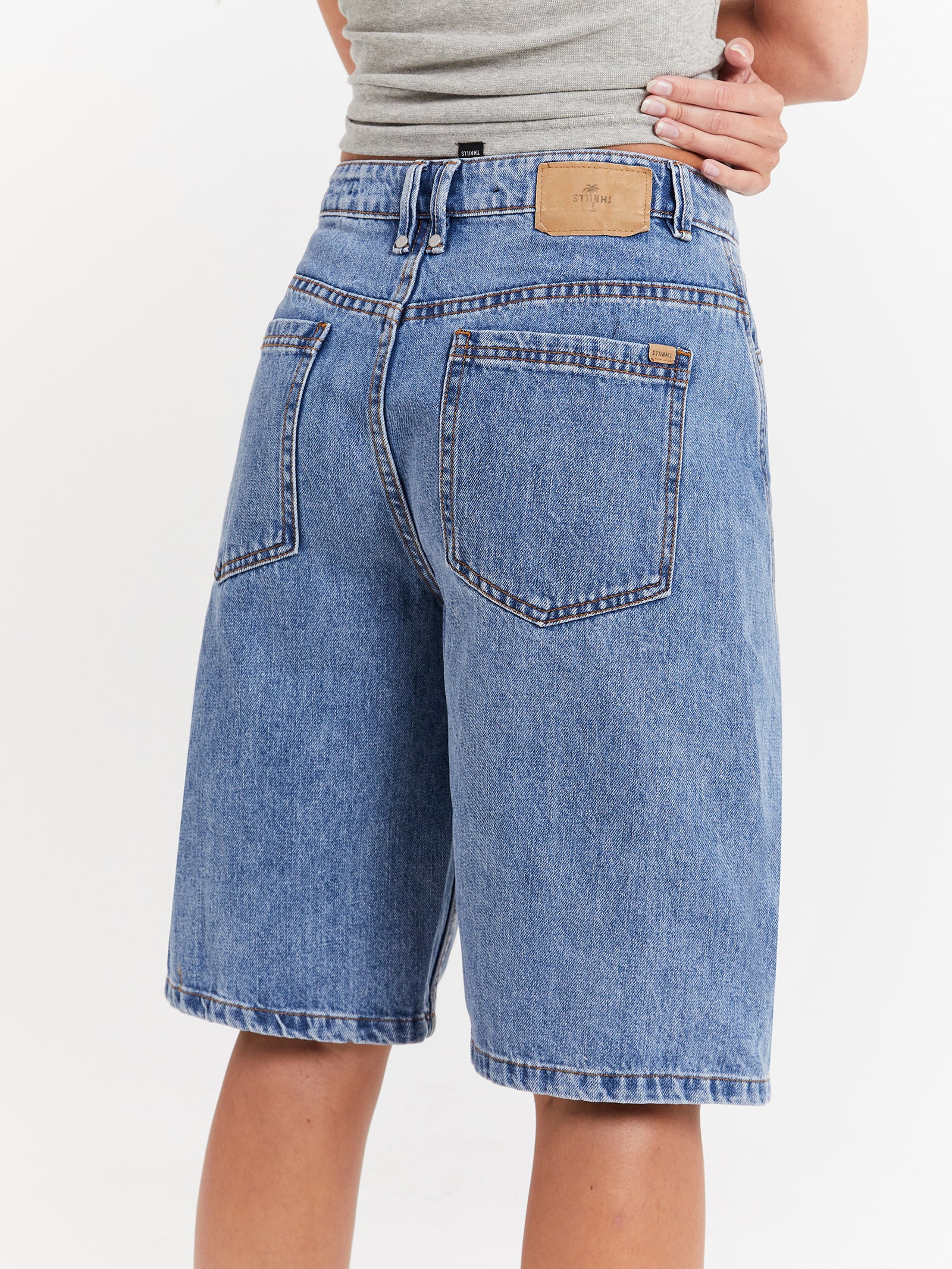 Ronnie Pieced Denim Shorts in Rinsed Blue