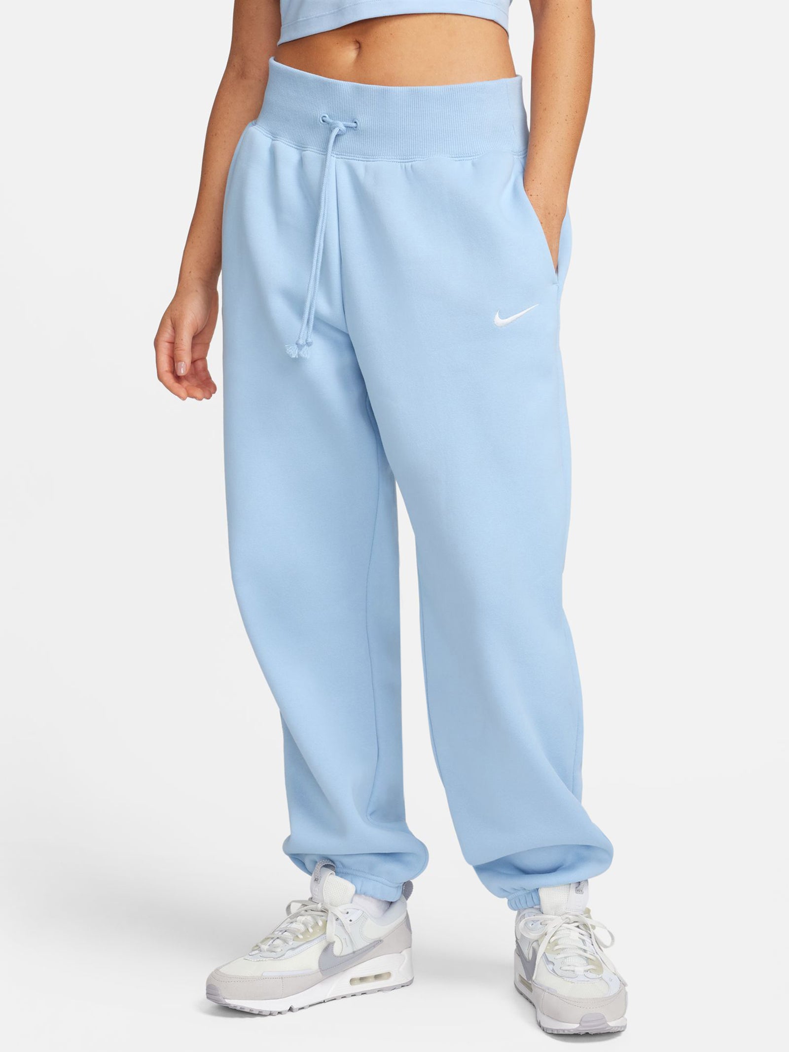 Sportswear Phoenix Fleece Trackpants in Light Armory Blue & Sail