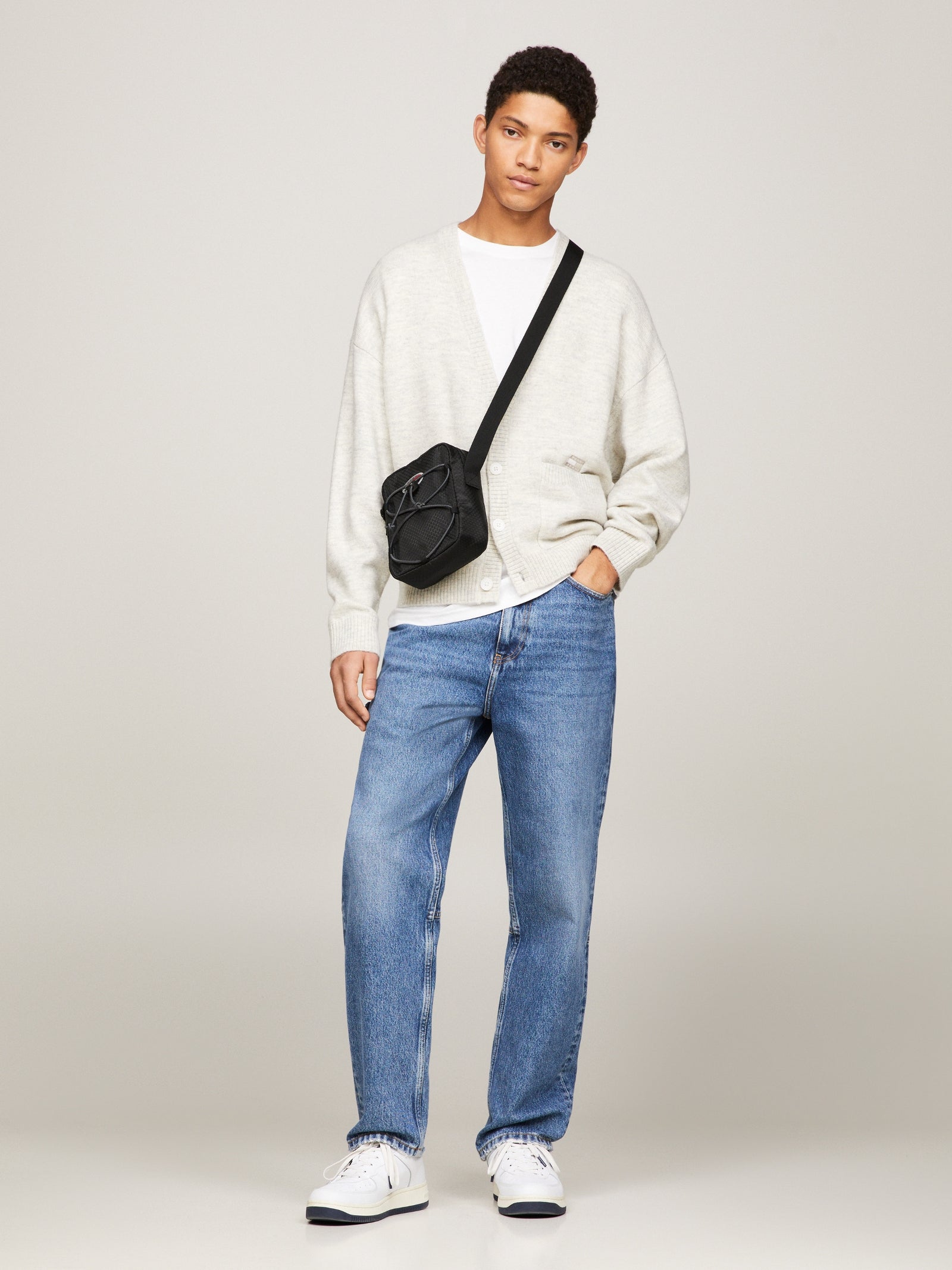 Skater Boy Reporter Sling Bag in Black